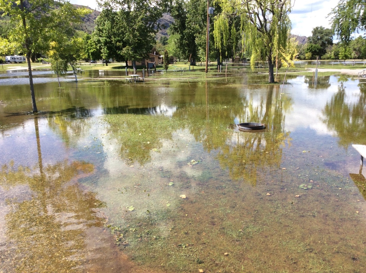 Floodwaters on Osoyoos Lake covered Veterans Memorial Park in Oroville, Washington, in early June. Waters entered communities throughout the Okanagan basin in Washington and British Columbia. Credit: Brian Symonds