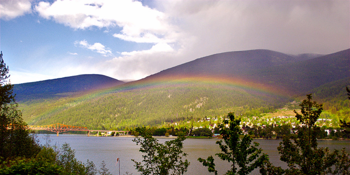 A rainbow over Kootenay Lake and the Nelson Bridge. Credit: Adam Harvey. 