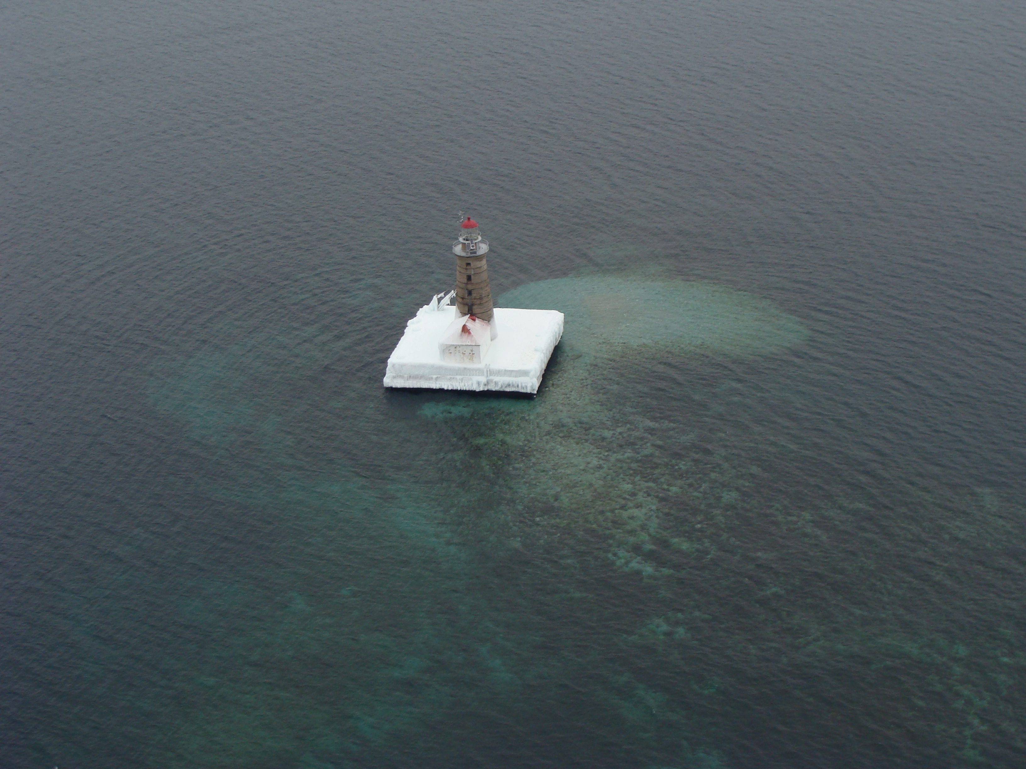 Spectacle Reef Lighthouse in northern Lake Huron surrounded by open water, January 2014. Credit: Dick Moehl.