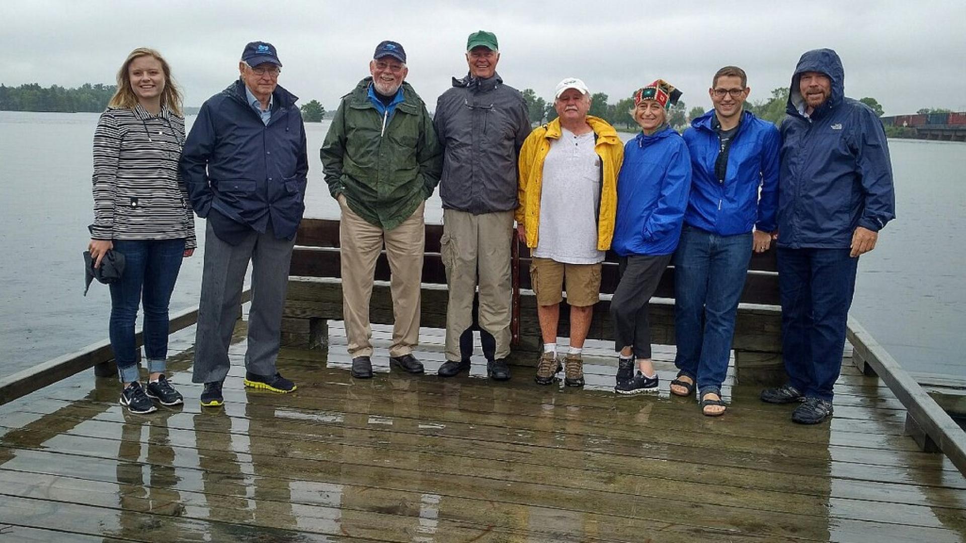 Water Matters - IJC Co-chairs pose with staff and residents on the Rainer rail bridge