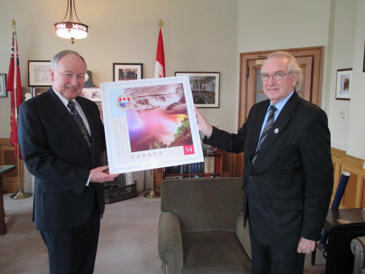To recognize Minister Nicholson’s long association with both the IJC and the Niagara region, Chair Walker presented him with a large scale copy of the stamp issued by Canada Post to commemorate the 100th Anniversary of the Boundary Waters Treaty 